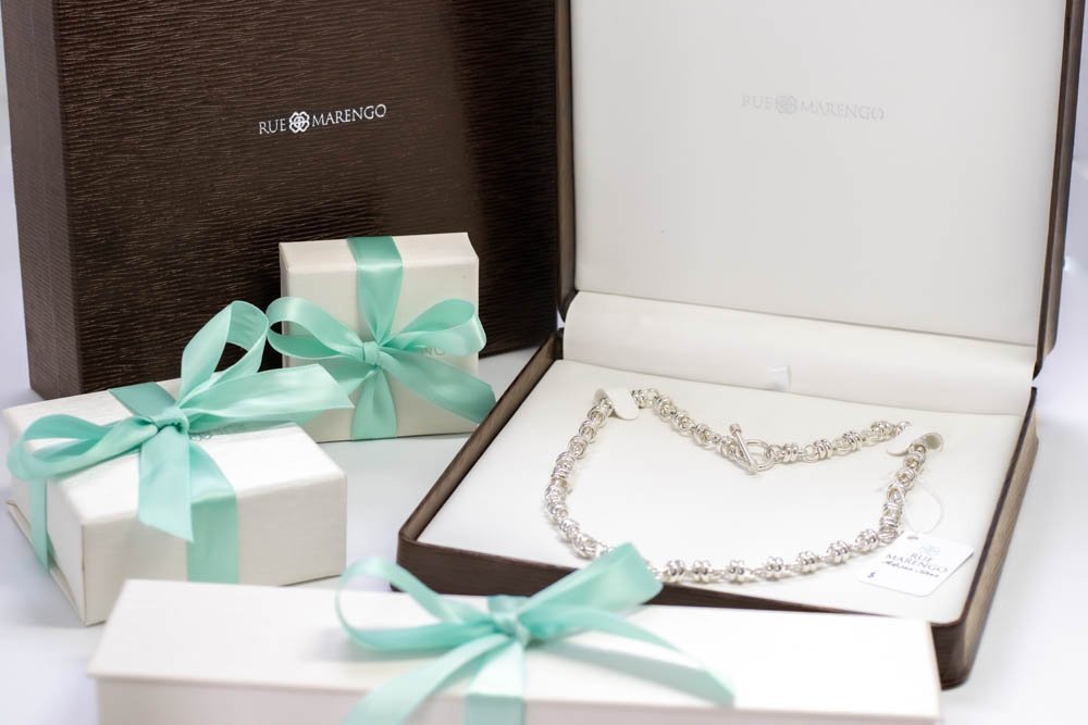 Rue Marengo white gift boxes with ribbons